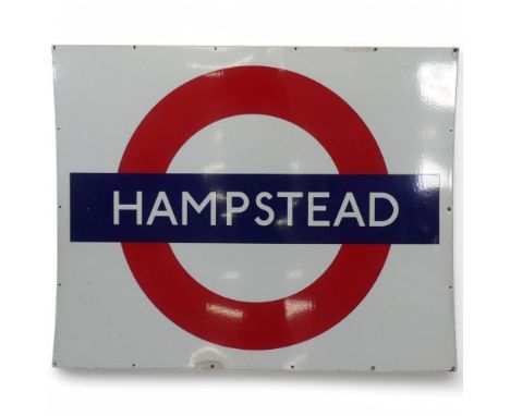 An enamelled London Underground Hampstead station sign. Width 151.5cm, height 121cm.Good condtion with signs of age. Three la