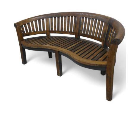 A painted hardwood Lutjens style banana shaped bench. Length 160cm, height 83cm, depth 73cm (approximate).