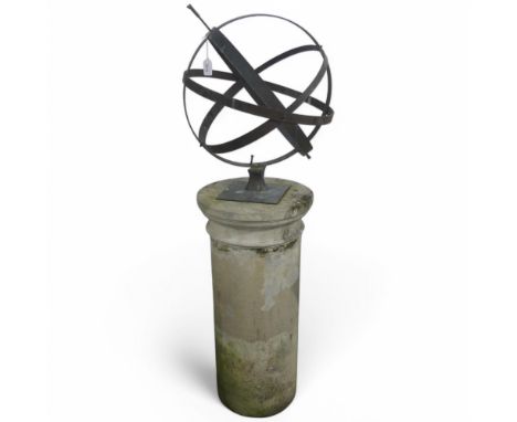 A bronze armillary sphere mounted on a reconstituted stone column. Overall height 136cm.Tail and tip of arrow is missing.