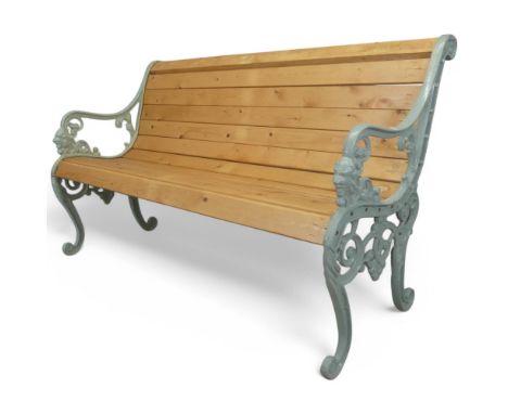 A pine slatted garden bench with painted cast aluminium ends. Length 142cm, height 79cm, depth 62cm.