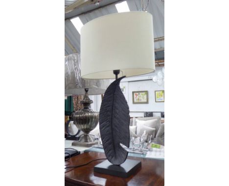 TABLE LAMP, in the form of a feather, 82cm H including frame. 