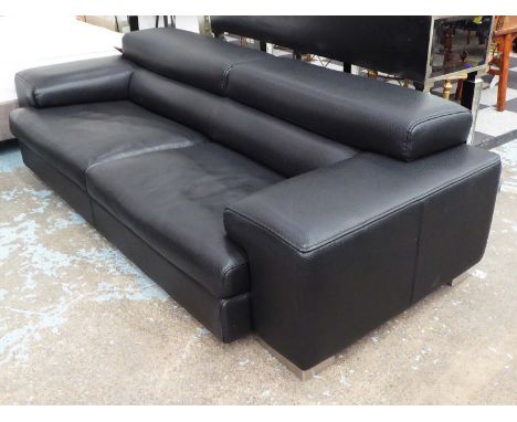 ROCHE BOBOIS SOFA, black leather with adjustable headrest, raised on square polished metal feet, 236cm L x 108cm x 85cm H.