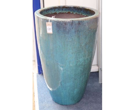An azure blue garden planter H.70cm