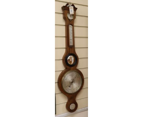 Hynes of Lynn. A Regency inlaid mahogany banjo barometer and thermometer H.100cm