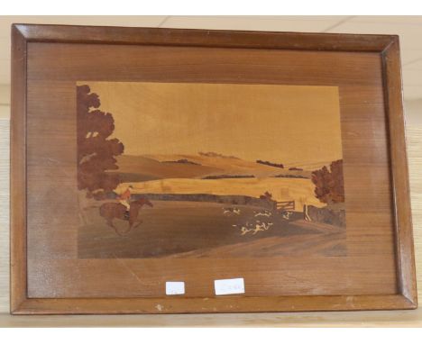An inlaid wooden panel of a fox hunting scene by A.H. McIntosh