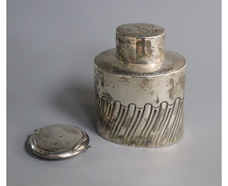 A late Victorian silver tea caddy, Sheffield, 1897 and a compact.