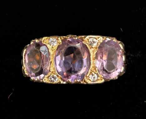 9ct Gold ring set with 3 large amethyst Size R 3.9g 