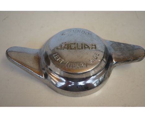 A mid-20thC original Jaguar cars chrome platedeared wheel spinner, marked with an arrow and‘UNDO JAGUAR LEFT (NEAR) SIDE’, wh