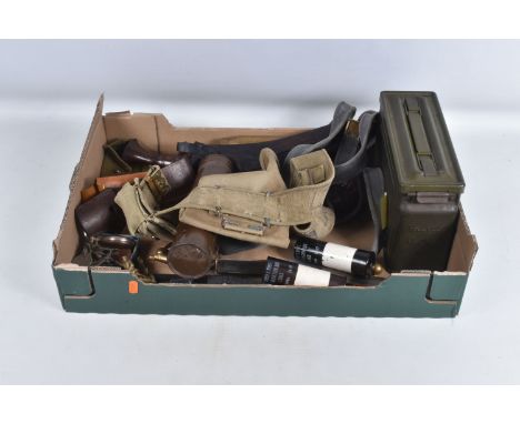 A BOX OF ASSORTED MILITARIA, including canvas belts and holsters, three strung dog tags for 10571193 DAVEY R C E, a photograp