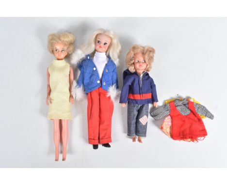 AN UNBOXED PEDIGREE PATCH DOLL, head marked 'Made in England', body marked 'Made in Hong Kong', wearing dungarees and with th