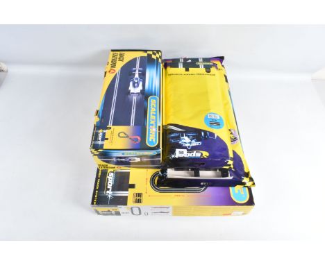 A BOXED SCALEXTRIC SPORT ADVANCED TRACK SYSTEM RACE KIT WITH TRACK EXTENSTION PACKS,  with Grand Prix Racer No. 5 and Grand P