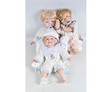 TWO UNBOXED LEONARDO COLLECTION PORCELAIN BABY DOLLS, 'Camilla' complete with name swing tag, another one unfortunately missi