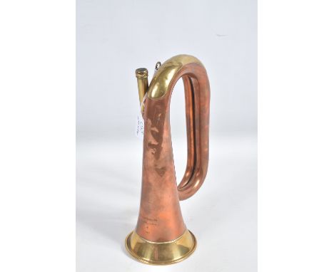 A POST WWII MILITARY MILITARY BUGLE, this was made by Boosey &amp; Hawkes, the bugle is made from brass and copper with a mil