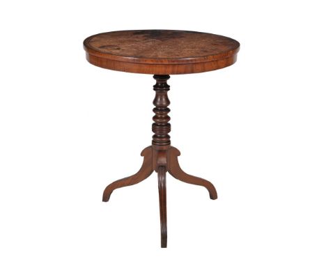 A Regency mahogany circular occasional table, circa 1815, the top with leather inset panel, 73cm high, 61cm diameter