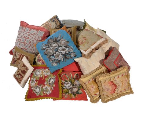 Three various French wool and silk tapestry cushions in Rococo taste, 18th century and later, the woolwork fragments woven wi