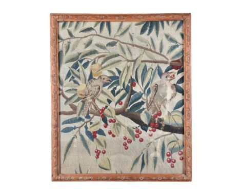 A Continental, possibly French, verdure tapestry fragment, 18th century, with two birds perched on berried and fruiting branc