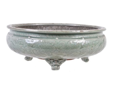 A Longquan celadon-glazed tripod bulb bowl, Ming Dynasty, the bowl with rounded body moulded and incised on the exterior with