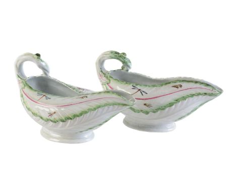 A pair of Worcester cos lettuce-leaf sauce boats, circa 1758, typically modelled and printed and  painted with insects within