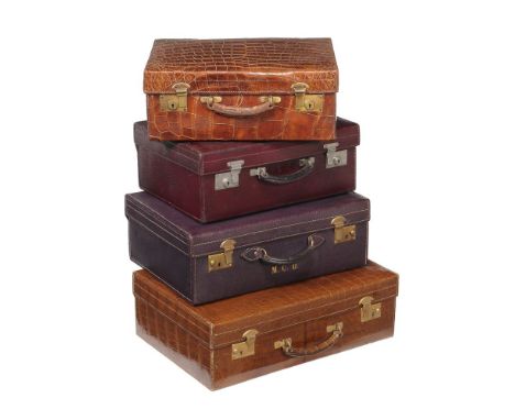 ϒ A group of vintage luggage, various dates first half 20th century, comprising; a crocodile suitcase by Whitlocks, gilt stam
