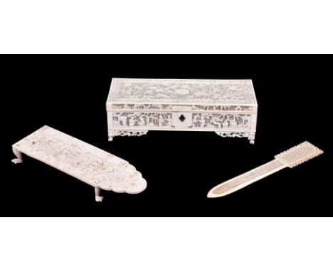 ϒ A Cantonese ivory pierced casket and cover, Qing Dynasty, circa 1850, with hinged cover, carved with animals, figures and f