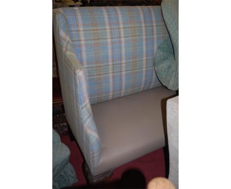 An early 20th century highback two seater sofa on carved cabriole supports and claw and ball feet 