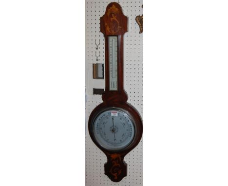An Edwardian mahogany and satinwood inlaid two dial aneroid barometer