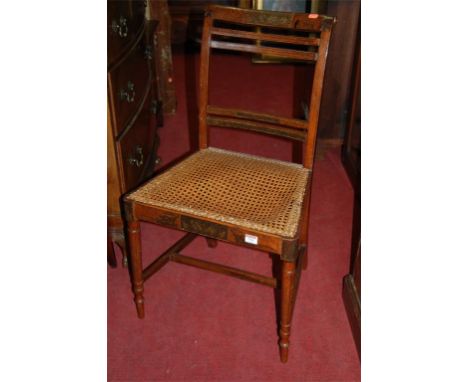 A 19th century polychrome decorated and cane seat side chair together with a carved oak wall shelf (2)
