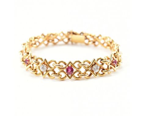 An early 20th Century Austro Hungarian gold ruby and diamond bracelet. The bracelet formed with fancy links having three claw