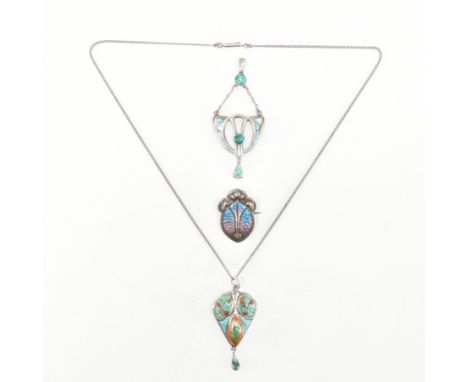 A hallmarked silver &amp; enamel necklace pendants &amp; brooch pin. The brooch having a planished heart panel ground with pi