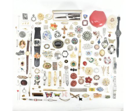 An assorted collection of costume jewellery. The lot to include; diamonds, brooches, pins, wrist watches, necklace pendants, 