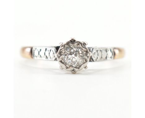 &nbsp;An 18ct gold and diamond solitaire ring. The ring set with an old cut diamond in a partial bezel setting to cathedral s