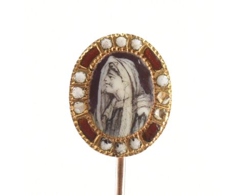 A Georgian gold and enamel stick pin. The stick pin having an enamel plaque depicting a woman framed by enamel decoration to 