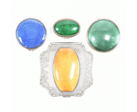 A white metal and amber compact together with three enamelled topped pots.&nbsp; The boxed two with internal mirror having en
