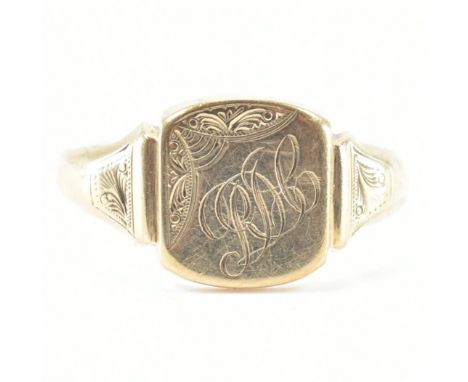 A hallmarked 9ct yellow gold signet ring. The ring having a rounded square head with etched monogram &amp; scrolling details 