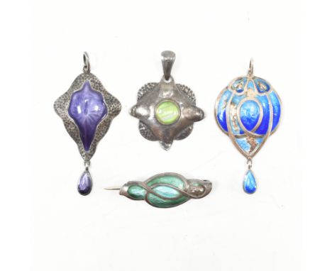 A group of white metal necklace pendants &amp; brooch pin. The lot to include; banded green stone cabochons set planished gro