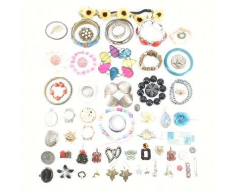 An assorted collection of costume jewellery. The lot to include; earrings, necklaces, chains, pendants, ring, brooch pins, wr