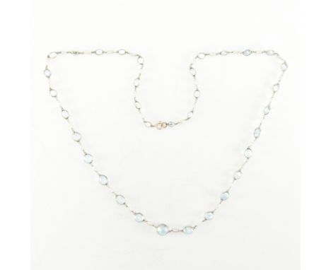 A 9ct yellow gold, aquamarine &amp; baroque pearl necklace chain. The necklace comprised of graduating bezel set aquamarines 