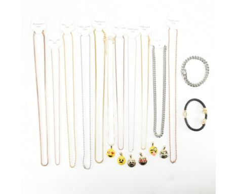 A large assorted collection of costume jewellery. The lot to include; gold & silver tone metal, bracelets, charms, pendants, 