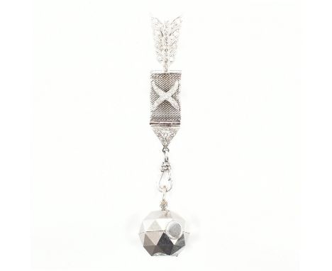 An Art Deco UTI (Utinam) Paris pendant watch. The watch in geodesic ball form strung upon a diamond set arrow mesh fob to dia