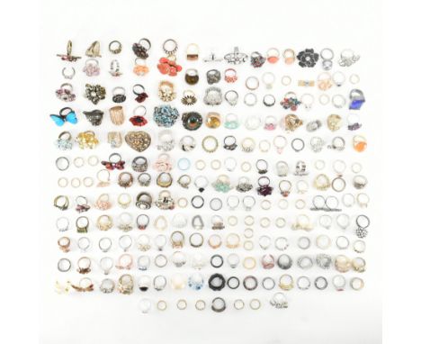 An assorted collection of costume jewellery rings. The lot to include; gold &amp; silver tone metal, beads, white stones, var