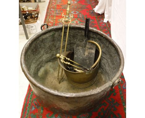 A Victorian copper cauldron, together with coal helmet, various fire tools, coal shovel and copper coal container and lid and