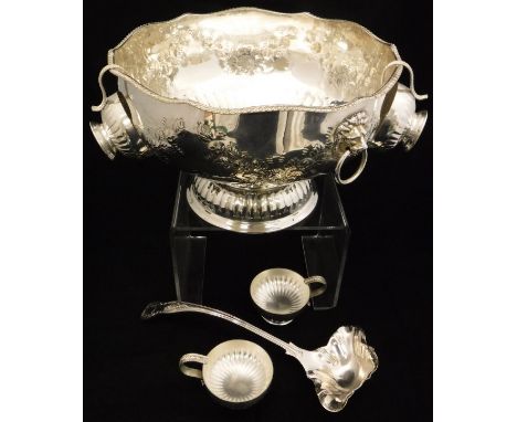 A silver plated twin handled punch bowl with floral swag decoration and lion head masks, together with a Kings pattern punch 