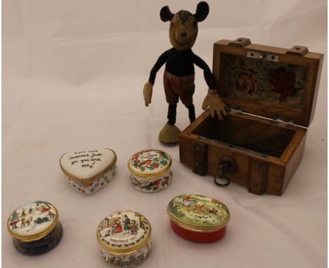 A collection of four Halcyon Days enamel decorated pill boxes, each for Christmas, dated 1979, 1981, 1982 and the last bearin