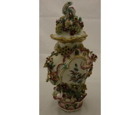 An 18th Century Chelsea or Derby frill vase and cover with floral encrusted and pierced decoration, the baluster-shaped body 