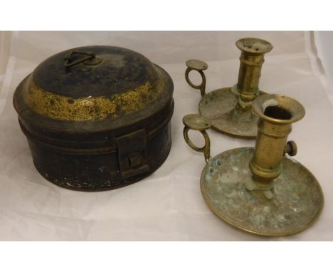 An early 19th Century painted tin spice box with sectional interior, together with a pair of brass ejector chamber sticks, to