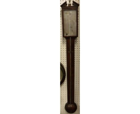 A mahogany cased stick barometer, the silvered dial inscribed "Barelli Reading" 