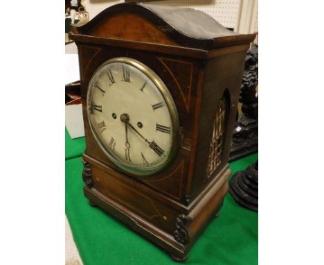 A 19th Century rosewood and inlaid cased mantle clock, the 8-day movement striking on a bell and with white enamel dial and R