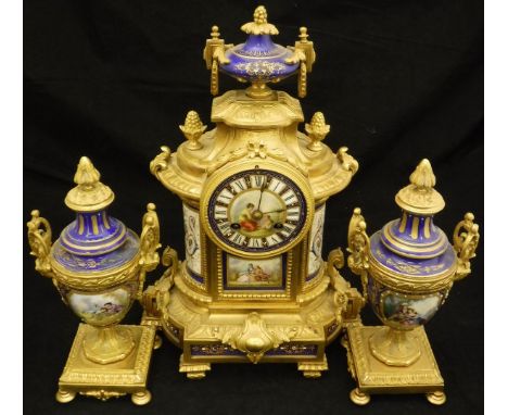 A 19th Century French gilt brass and porcelain cased clock garniture, the French 8-day movement with circular porcelain dial 