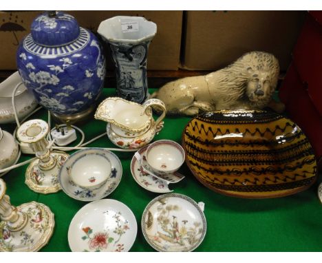 A collection of various pottery and porcelain to include Delft vase with floral decoration, signed to base "CP Kam", a slipwa