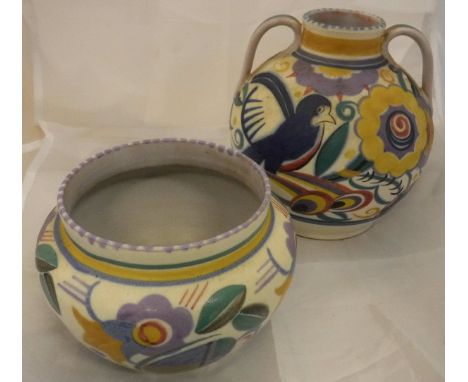 A Poole Pottery vase painted with bird amongst flowers, No'd to base 202/52, another similar vase, No'd. to base 922/TJ, a pa